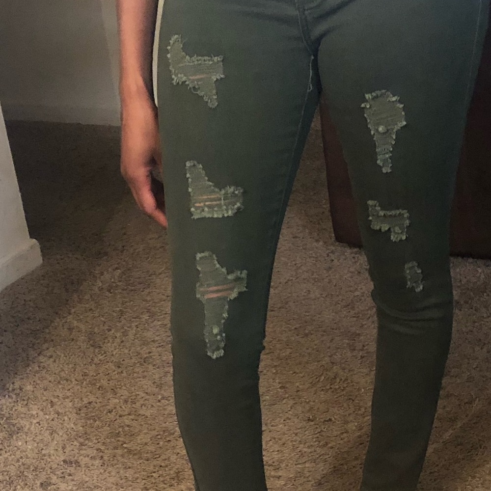 Army green ripped jeans
